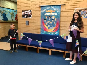 Talented youngsters receive their prizes in Mogers Drewett’s jubilee bunting design contest